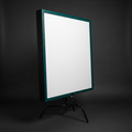 Bounce and negative-fill board — white face, black reverse, Deep Green edge