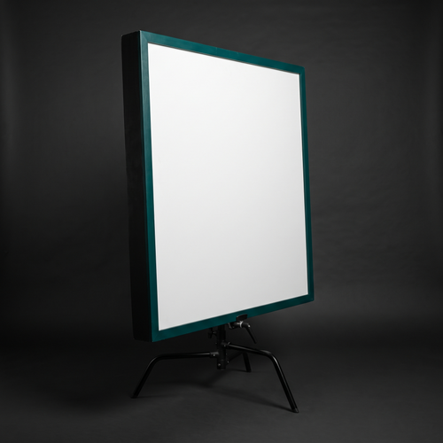 Bounce and negative-fill board — white face, black reverse, Deep Green edge
