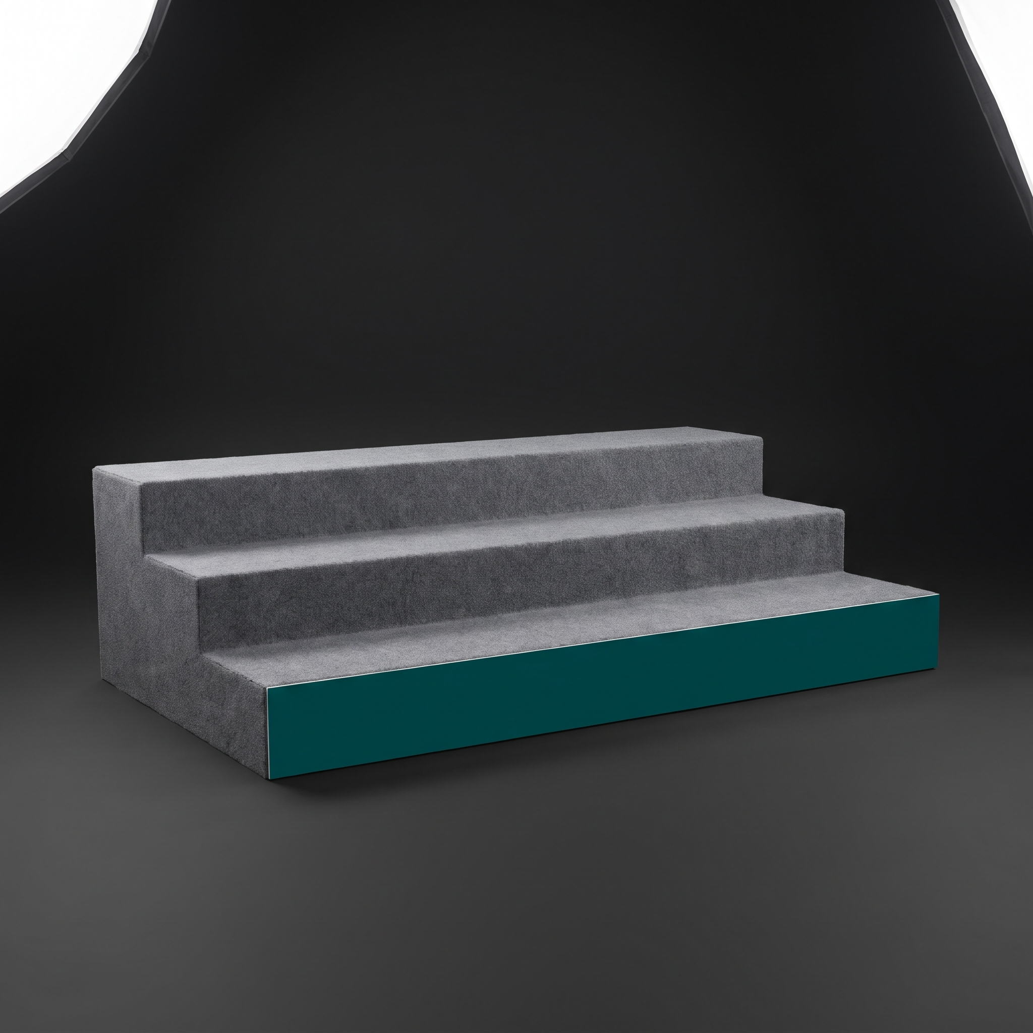 Stage fascia and carpeted steps with a Deep Green branded front